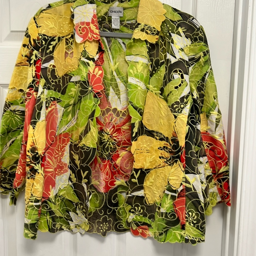 Chico’s size 2 open jacket embroidered w/cut outs.  3/4 sleeve jacket.